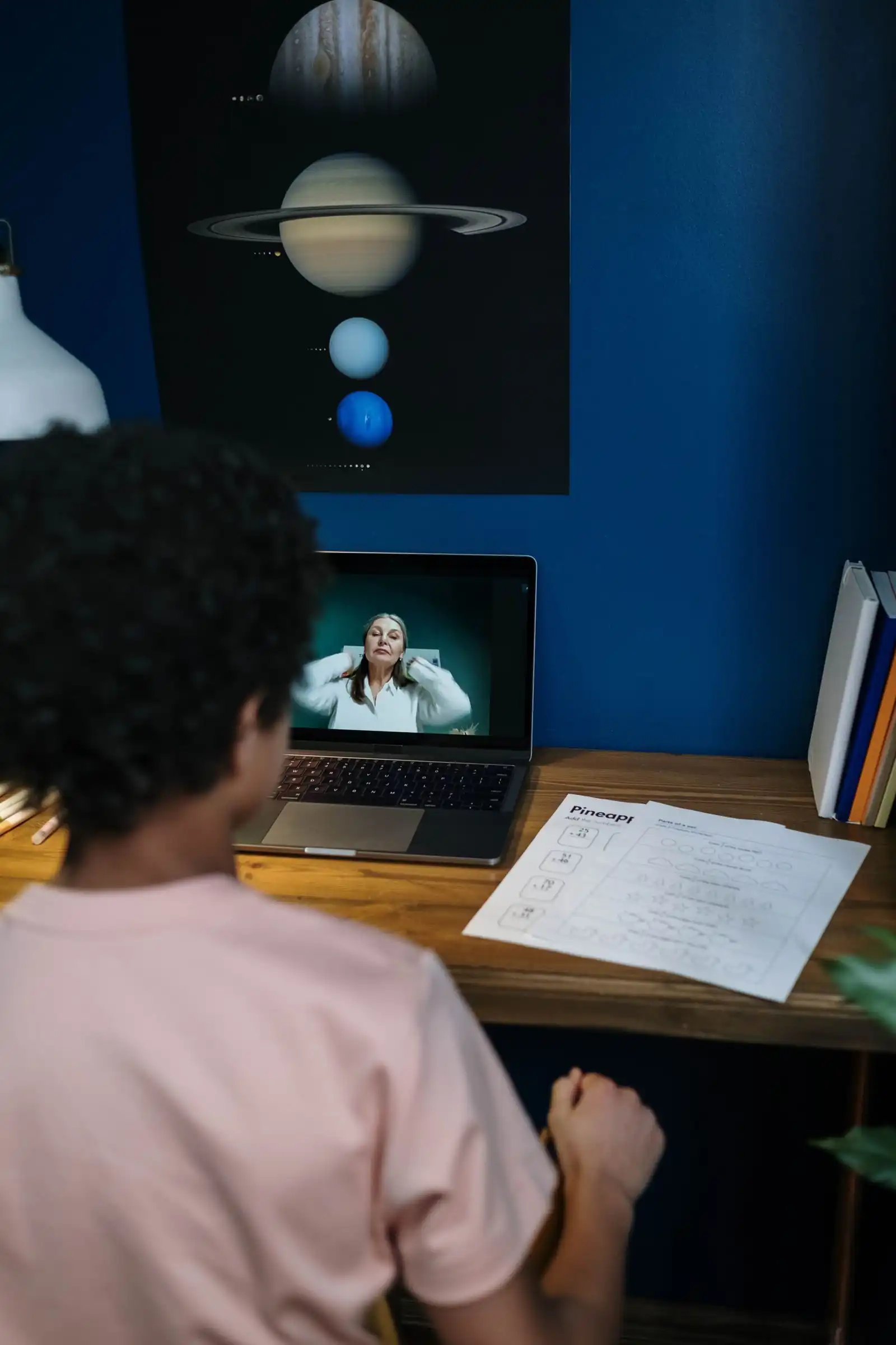 A student following an online class at home